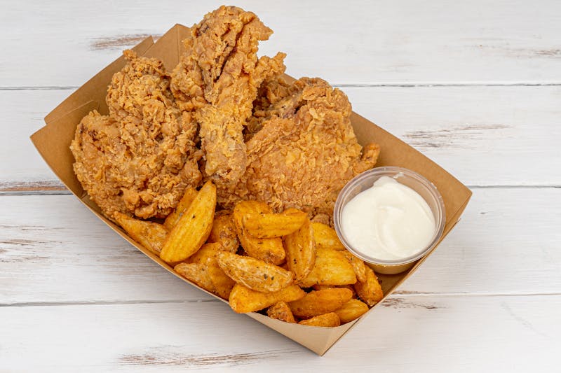 Two piece fried chicken combo with fries and drink
